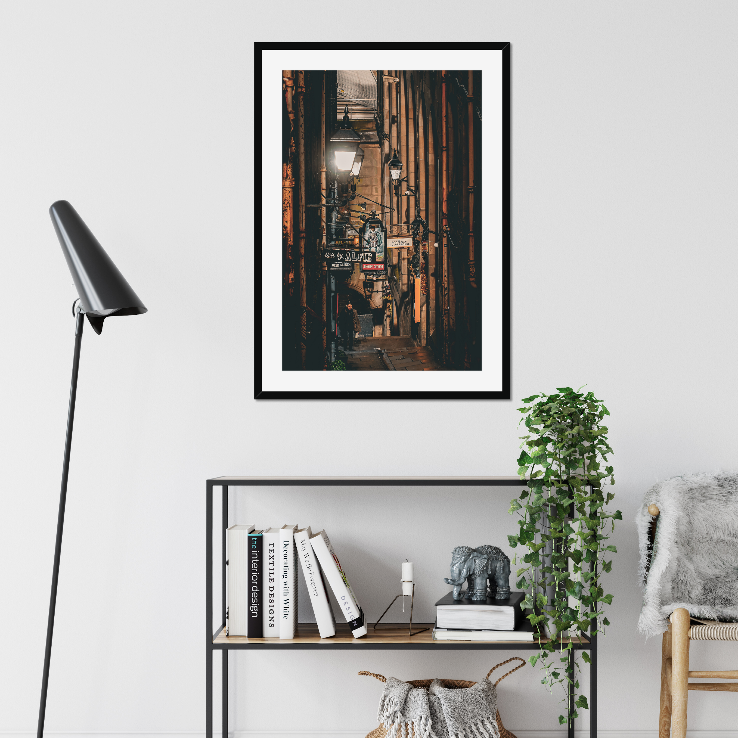 Atmospheric fine art photography of a figure walking through an Edinburgh close. A study in light, shadow and quiet movement from the Light & Shadow collection.