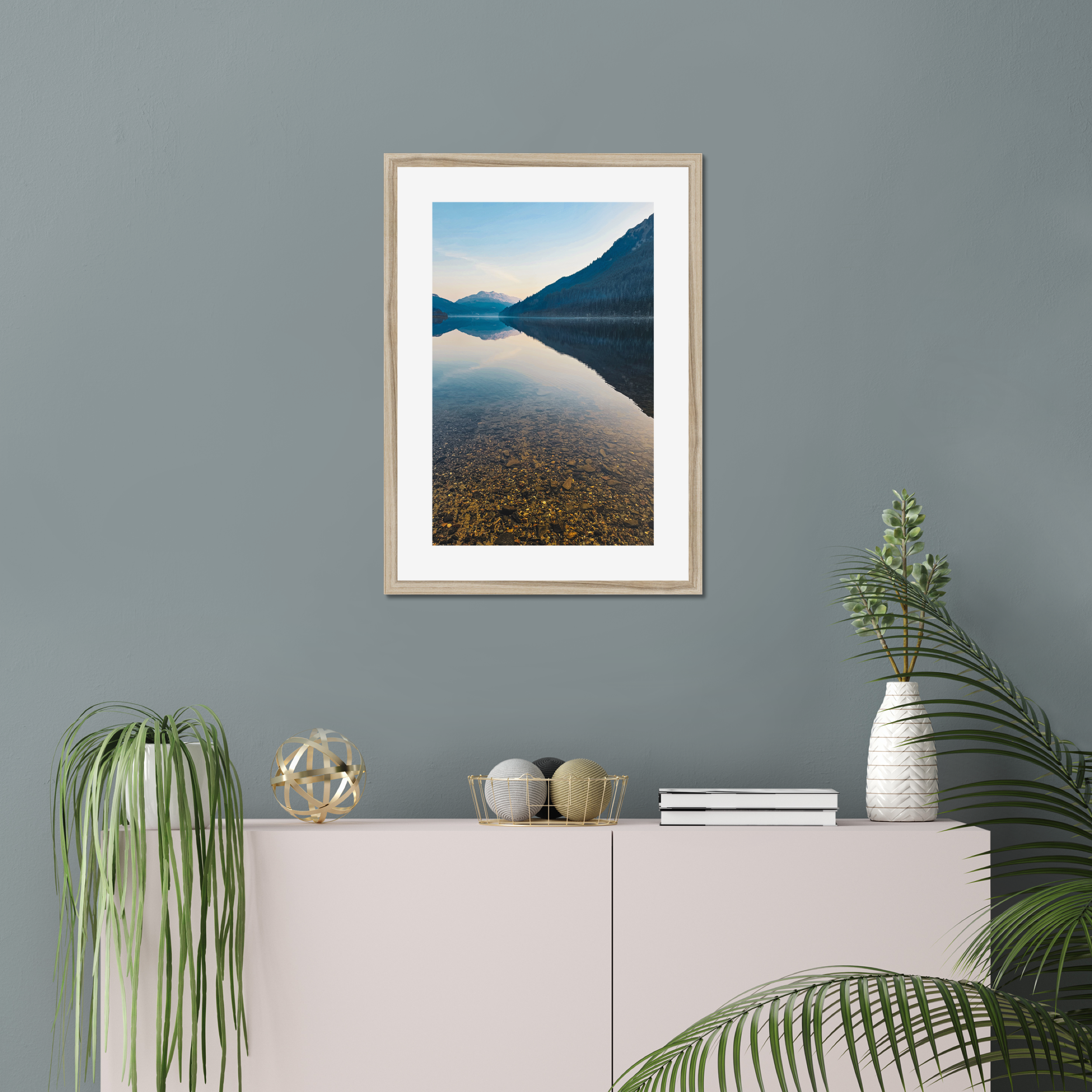 Before the Breeze at Loch Eck – fine art photograph of calm reflections on Loch Eck during a still spring afternoon in the Scottish Highlands. Mocked up with a white frame.