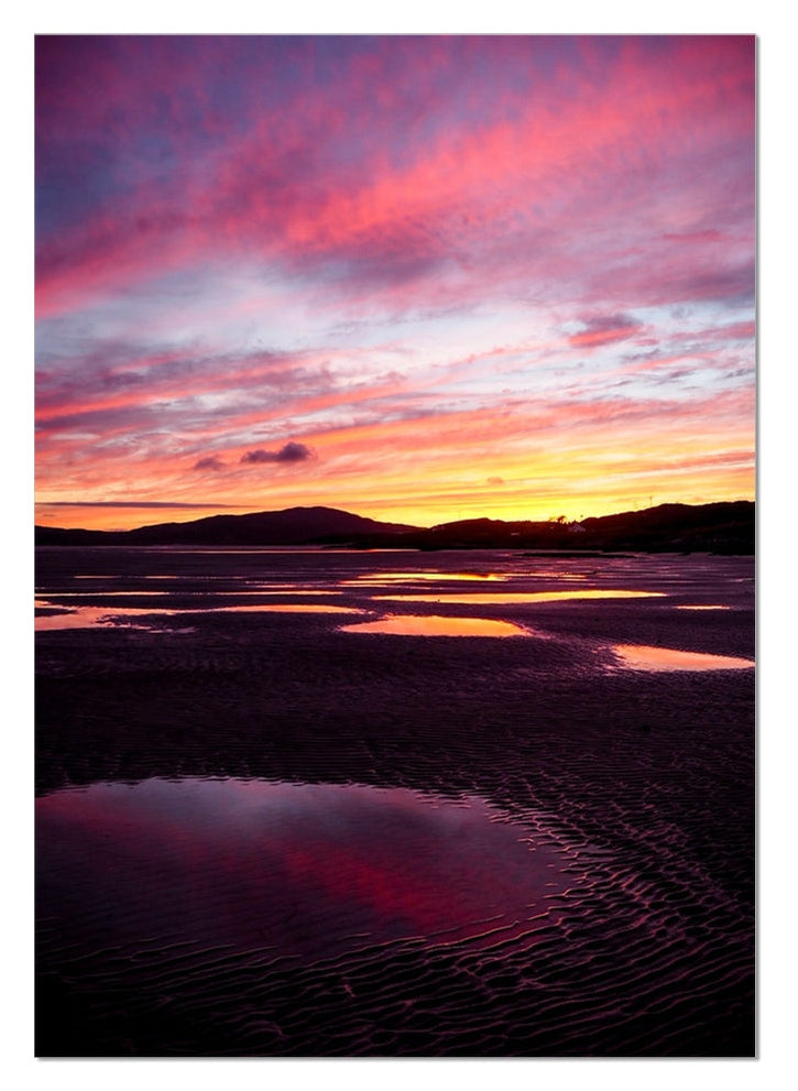 Last Light at Luskentyre captures a spectacular Hebridean sunset reflected across the tidal pools of Luskentyre Beach on the Isle of Harris.