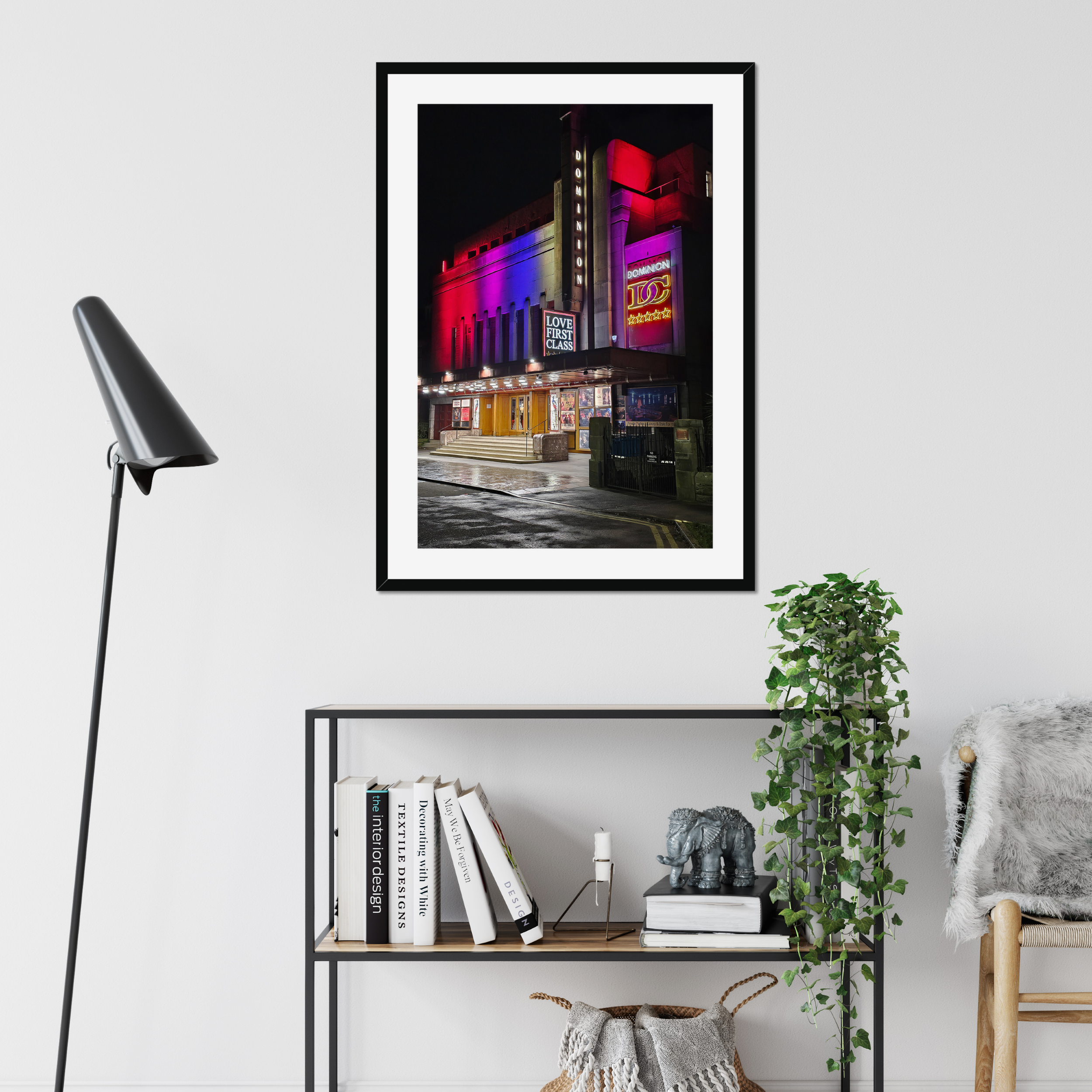 Mock up of The Dominion Cinema in Morningside at night with neon light reflecting on wet streets, fine art photography print.