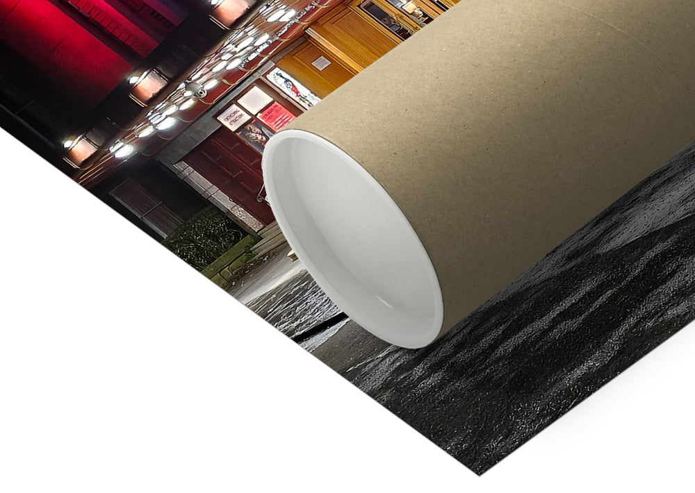 The Dominion Cinema in Morningside at night with neon light reflecting on wet streets, fine art photography print.