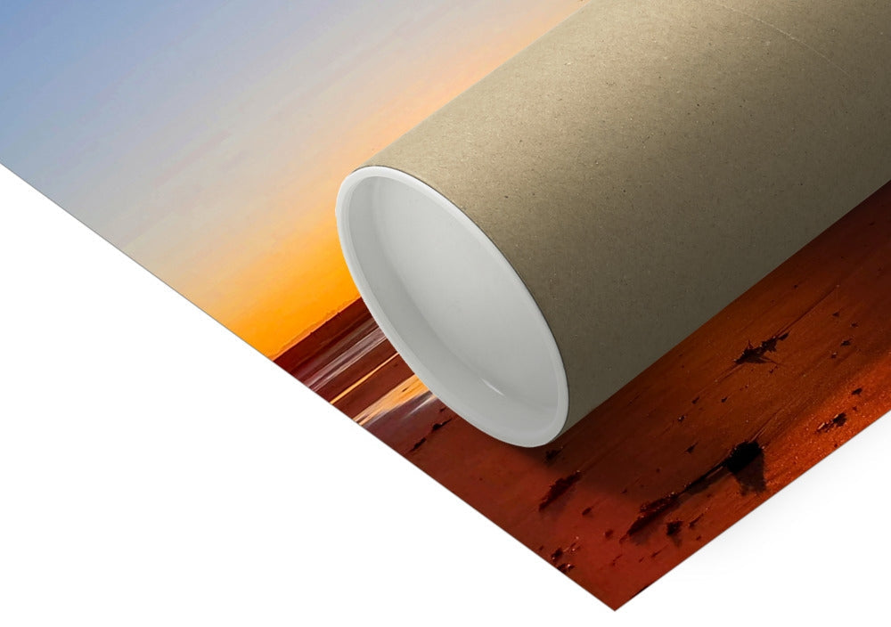 Coastal beach at Ellie, Fife, with early dawn light reflecting on wet sand and shallow water, photographed as part of a four-image panoramic shoreline series.