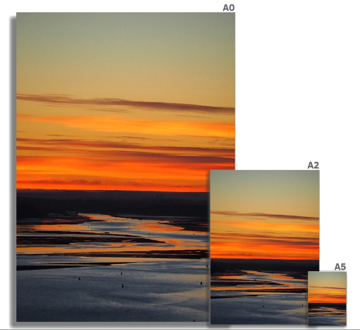 Pre-sunrise light colouring the sky over the River Clyde, looking towards Glasgow from Gourock, Scotland